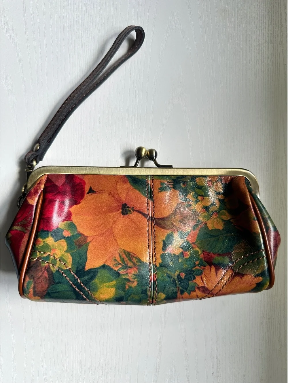 Patricia Nash Leather Wristlet with Retro Floral Print and Kiss Lock Closure